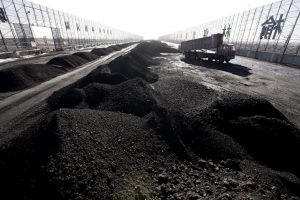 Coal truck on a coal station in Yulin, China. Decline of coal demand has reduced amount of trucks in the station.